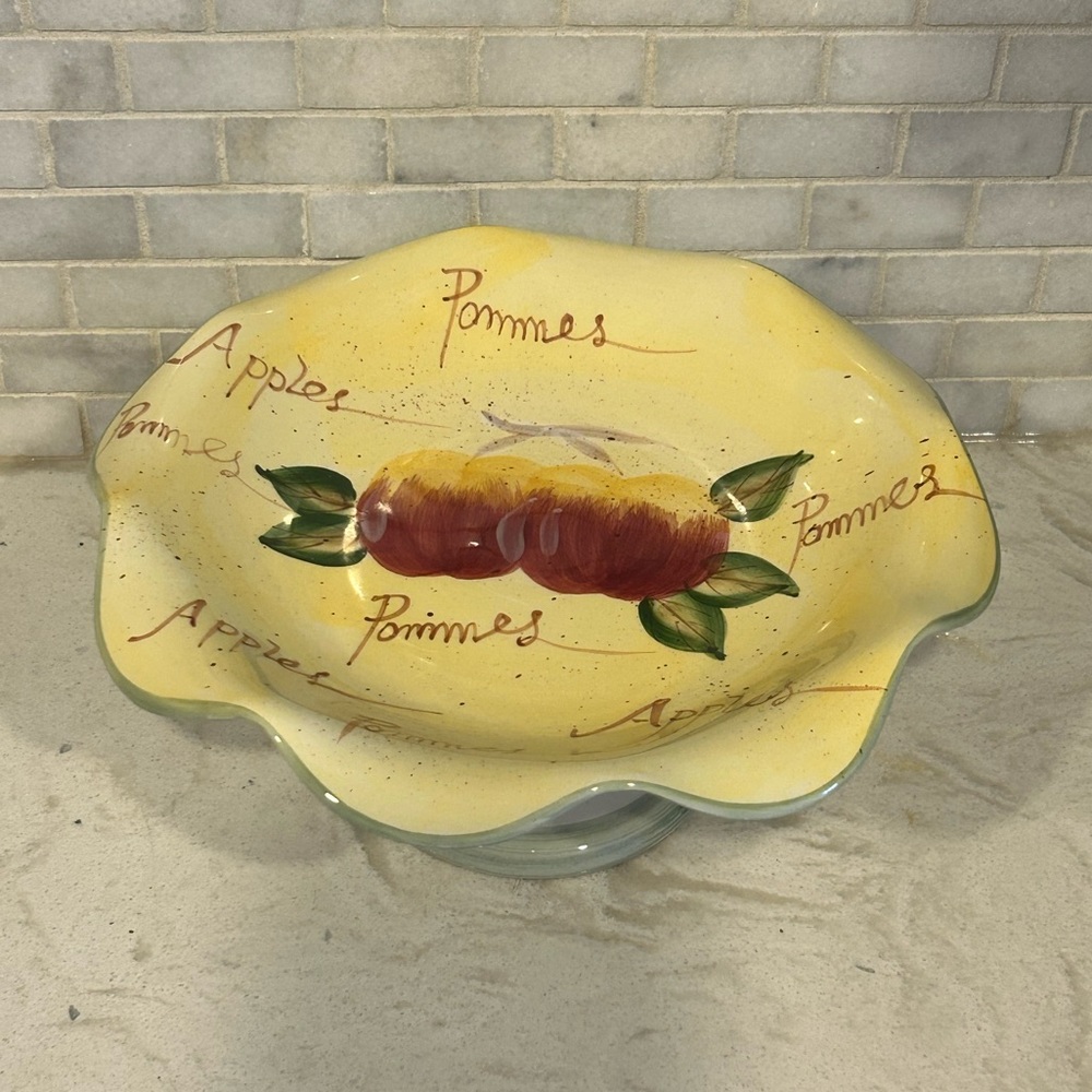 Frilled cake stand that says “Apple”